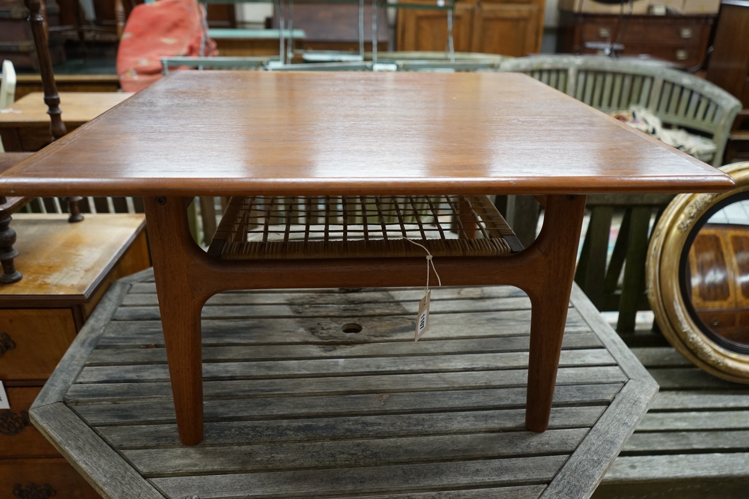 A mid century design Trioh Mobler Danish square teak coffee table with cane undertier, width 74cm, height 42cm